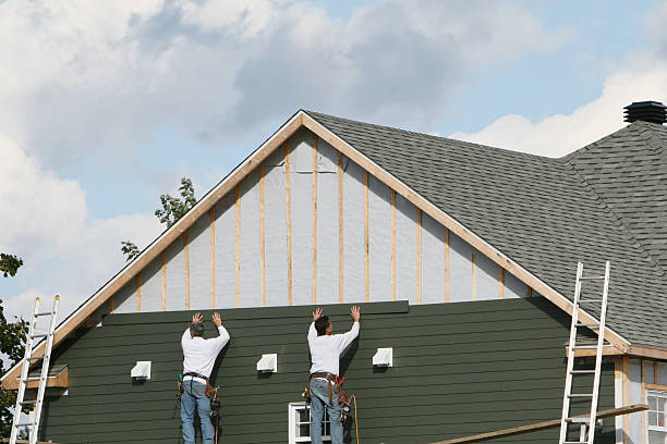Professional Siding Installation technician working in Rome, NY